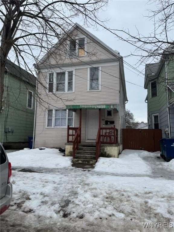 view of front of home with fence