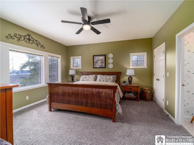 bedroom featuring ceiling fan, baseboards, and carpet flooring