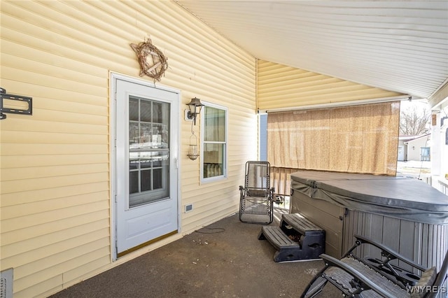 view of patio featuring a hot tub