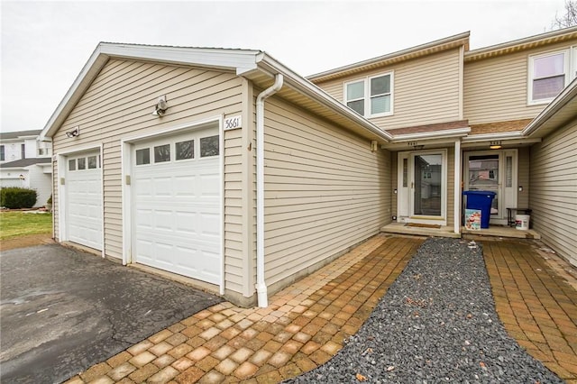 property entrance with a garage