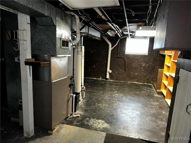 basement with gas water heater and heating unit