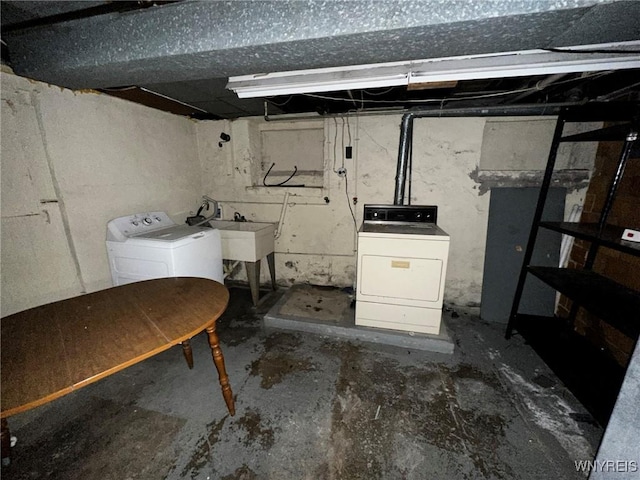 unfinished basement featuring washer and dryer