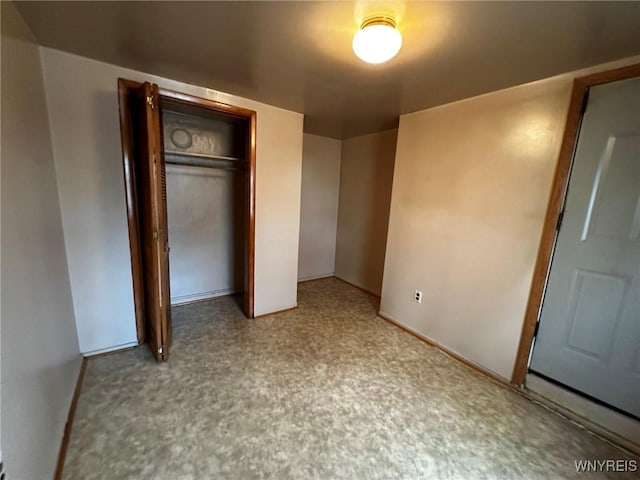 unfurnished bedroom featuring a closet