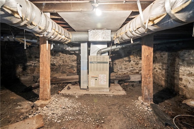 basement featuring heating unit