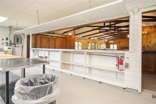 interior space featuring wooden walls and electric panel