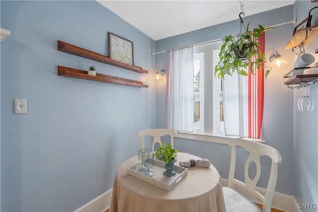 dining room with baseboards