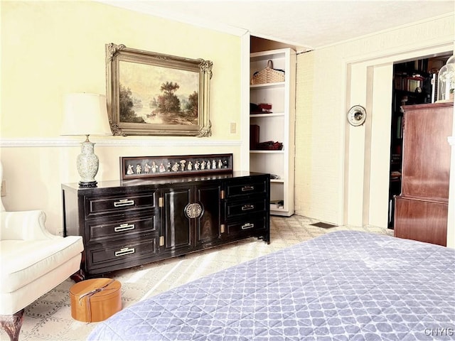 bedroom featuring ornamental molding