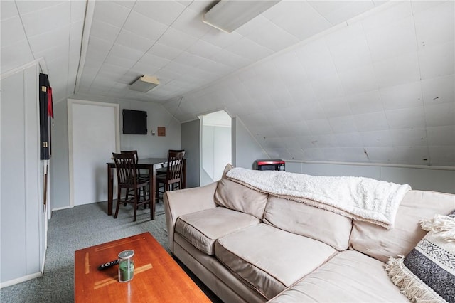 living area featuring carpet and lofted ceiling