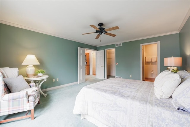 bedroom with light carpet, visible vents, baseboards, a spacious closet, and crown molding