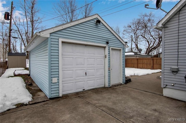 detached garage with fence