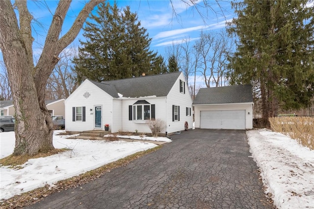 view of front of house with a garage and aphalt driveway