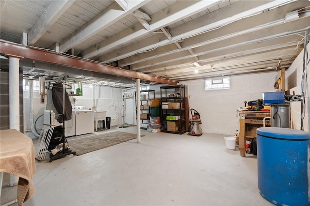 basement featuring separate washer and dryer