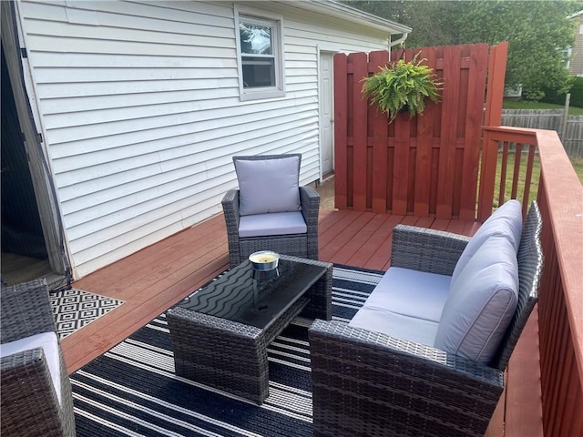 wooden deck featuring fence