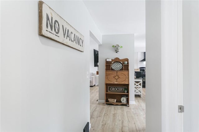 hallway featuring wood finished floors