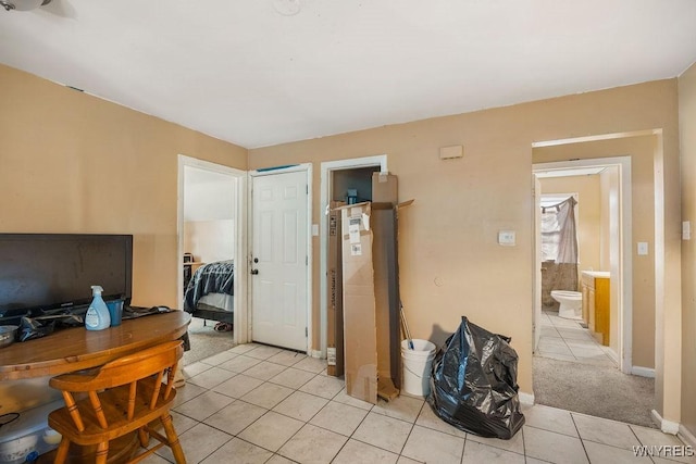 office with light tile patterned flooring and baseboards