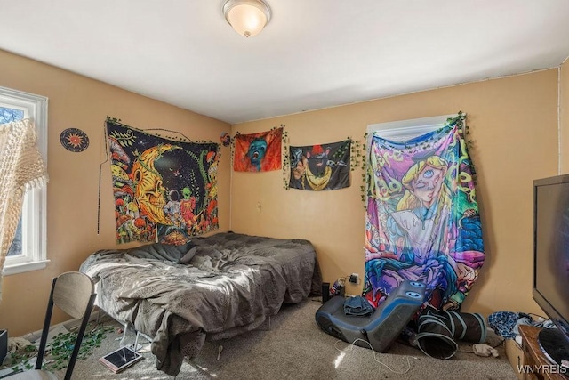 carpeted bedroom with visible vents