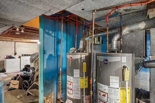 utility room featuring washer and dryer and gas water heater