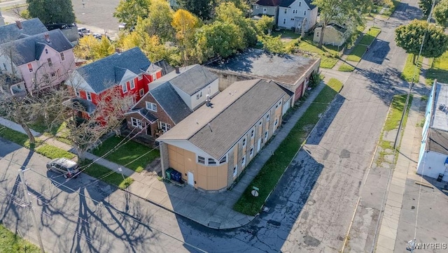 birds eye view of property with a residential view