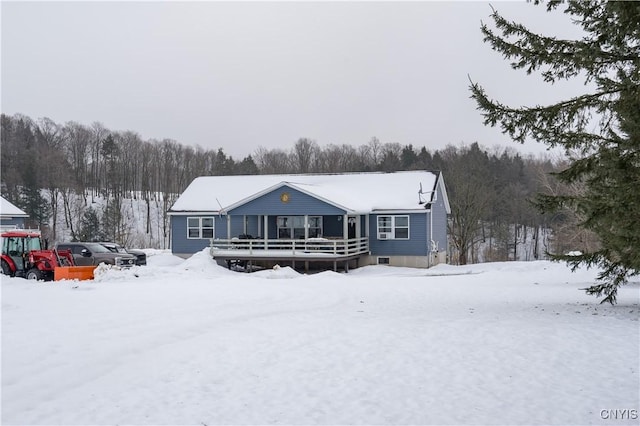 view of front of house featuring a deck