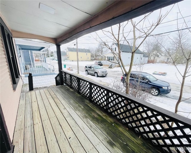 wooden deck with a residential view