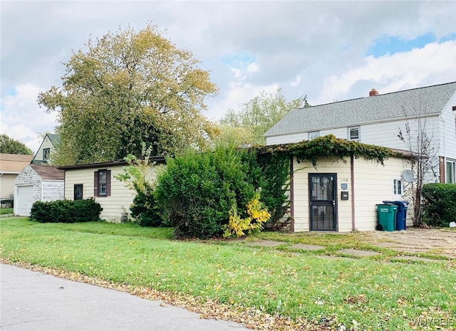 view of property exterior featuring a yard