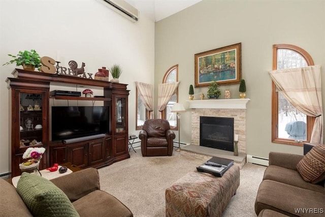 living area with a fireplace, a wall mounted AC, baseboard heating, and carpet flooring