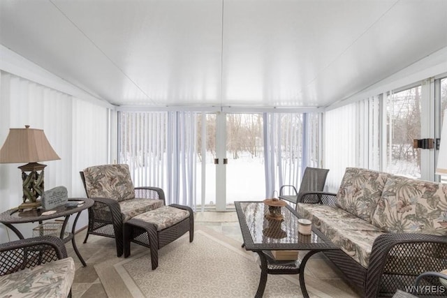 sunroom / solarium with vaulted ceiling