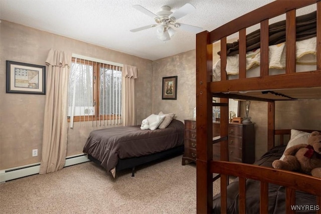 bedroom with a baseboard radiator, a textured ceiling, and light colored carpet