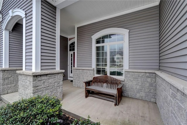 view of patio featuring a porch