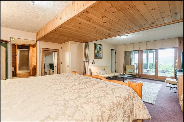 carpeted bedroom with a textured ceiling, access to outside, and wooden ceiling