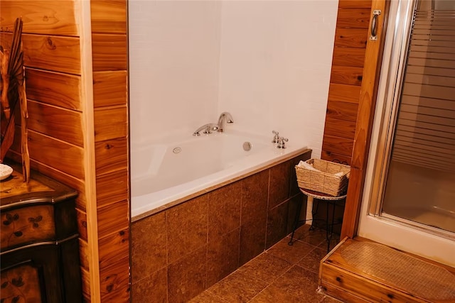 full bathroom with a shower with door, tiled bath, and tile patterned floors