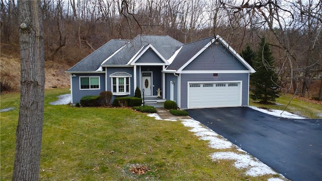 view of front facade featuring a garage, a front lawn, aphalt driveway, and roof with shingles