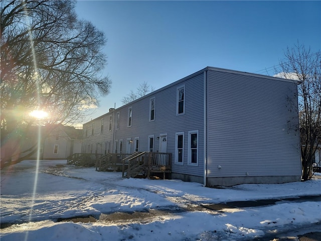 view of snow covered property