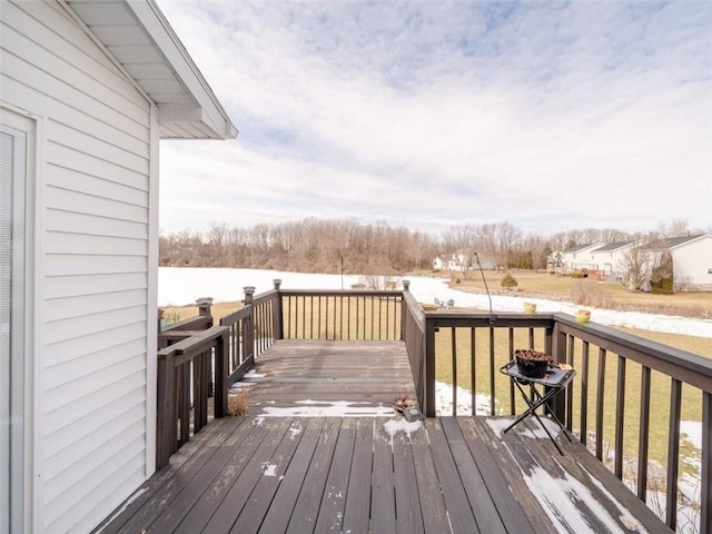 view of snow covered deck