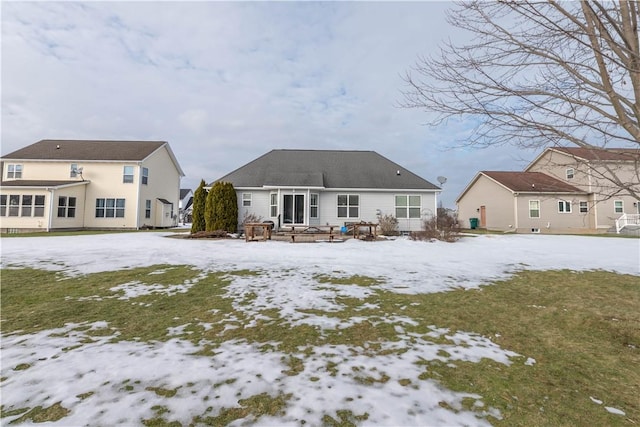 view of snow covered house