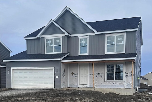 view of front of property with a garage