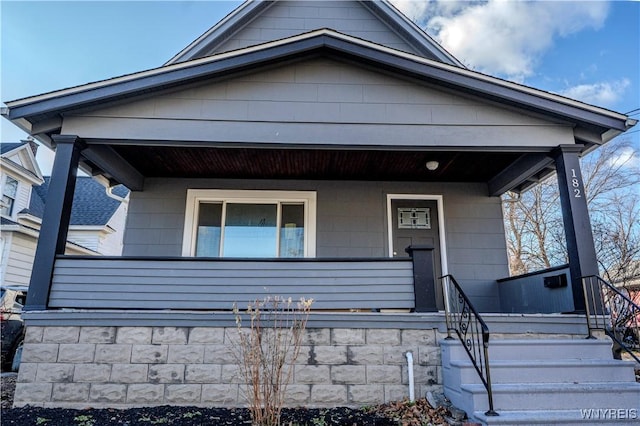 view of front of property featuring covered porch