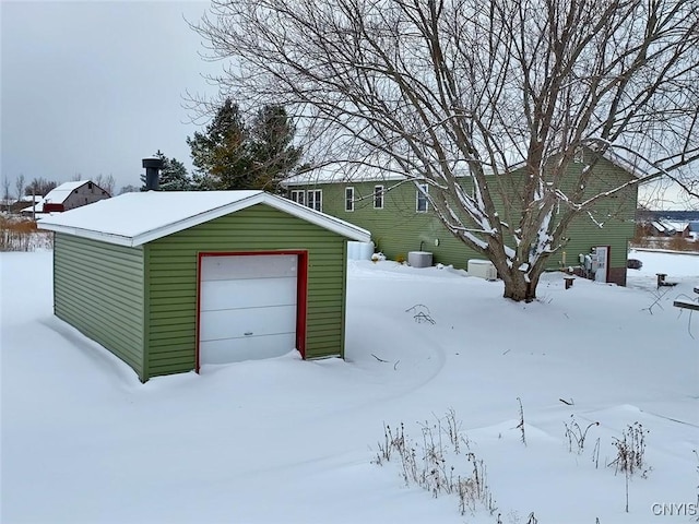 exterior space featuring a detached garage