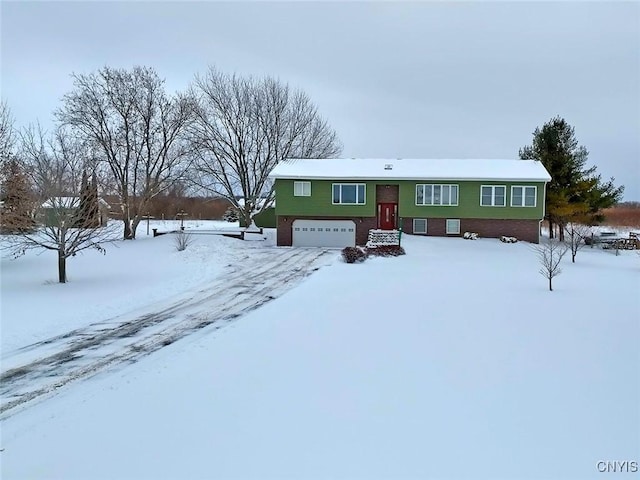 view of front of property featuring a garage