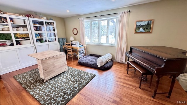 living area featuring hardwood / wood-style flooring