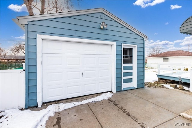 detached garage with fence