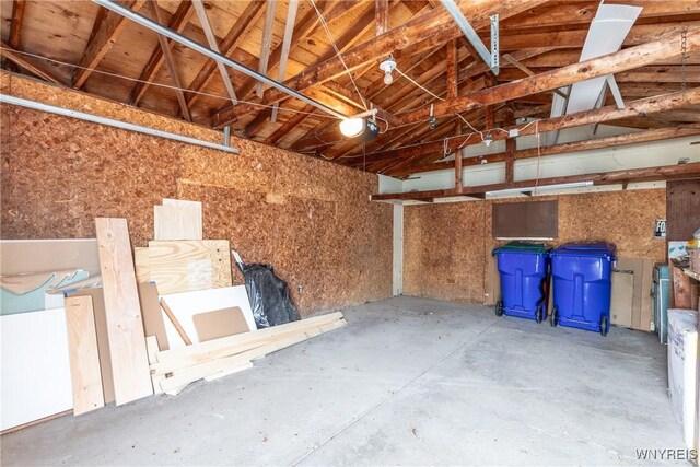 garage featuring a garage door opener