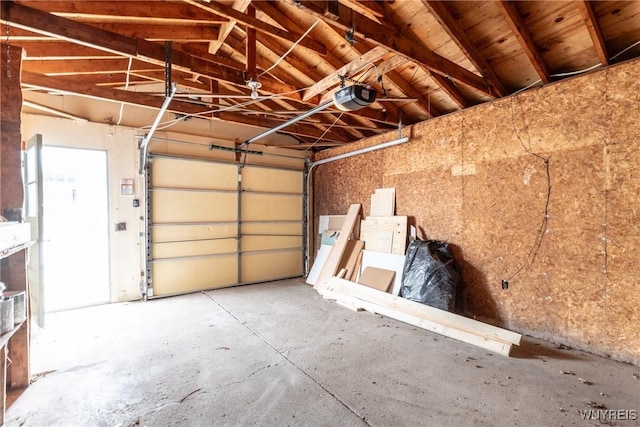 garage featuring a garage door opener