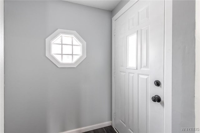 entryway featuring baseboards