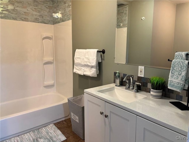 bathroom with tub / shower combination and vanity