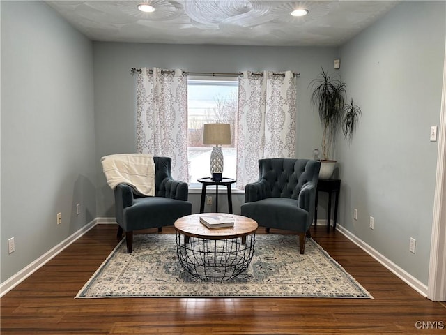 sitting room with recessed lighting, wood finished floors, and baseboards