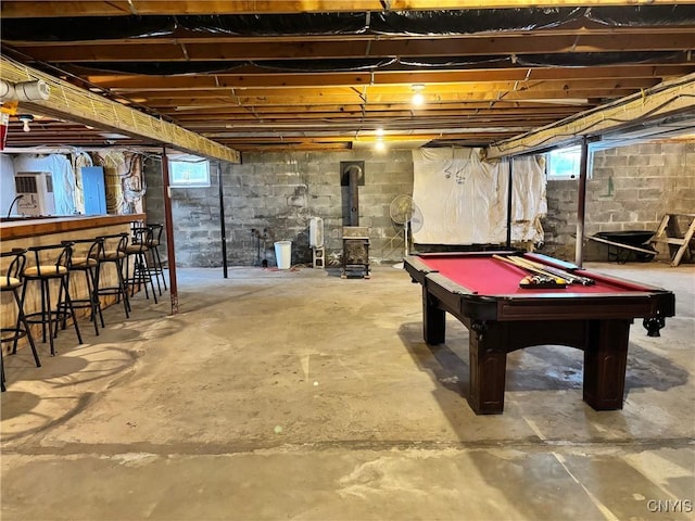 rec room featuring pool table, concrete floors, and plenty of natural light