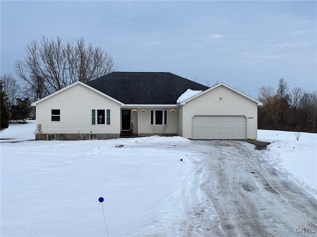 ranch-style house featuring a garage