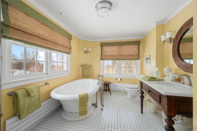 3789 State Route 12, Kirkland, NY 13323 - bathroom with toilet, crown molding, vanity, and a freestanding bath