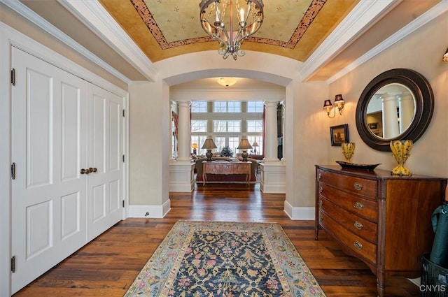 3789 State Route 12, Kirkland, NY 13323 - entrance foyer with dark wood-type flooring, lofted ceiling, baseboards, and ornate columns